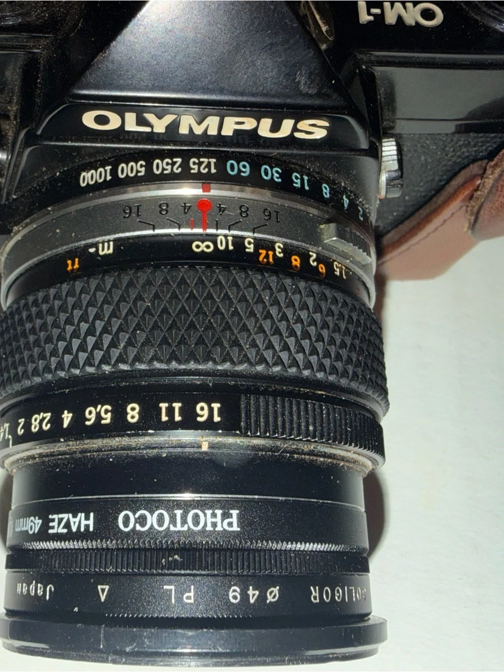 Olympus OM 1 SLR film camera with Original Leather  Case and Accessories